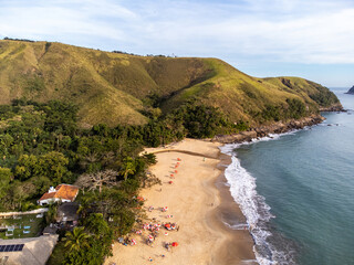 The incredible tropical beach amidst the green mountains