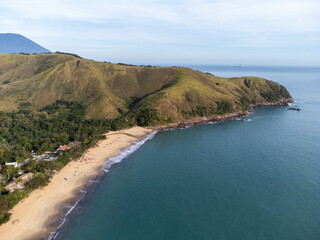 The incredible tropical beach amidst the green mountains