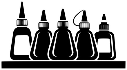 Obraz premium Glue sticks on desk and spills on floor with bottles on shelf tubes in box