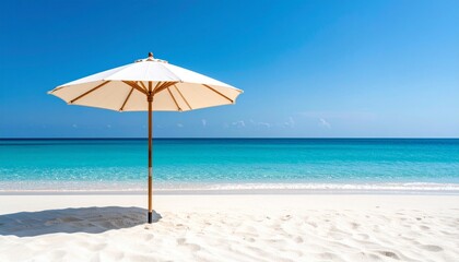 beach with umbrella and chairs