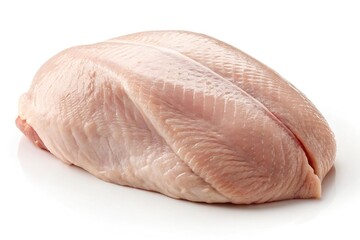 Raw chicken breast with skin isolated on white background