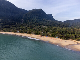 The incredible tropical beach amidst the green mountains