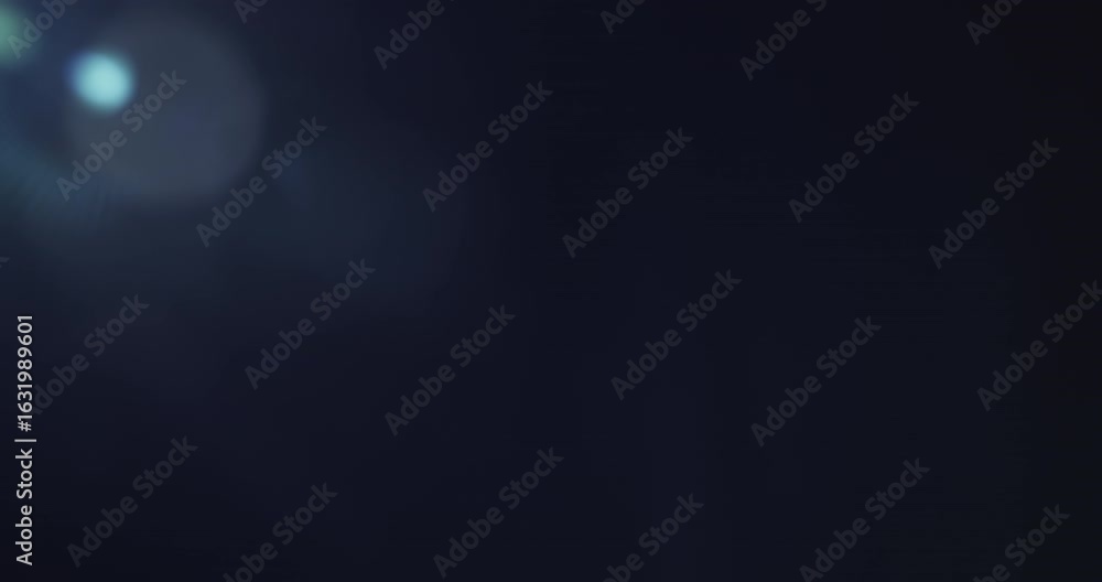 Poster soft blue lens flare with a gentle light gradient across a clear black background. ideal for overlay