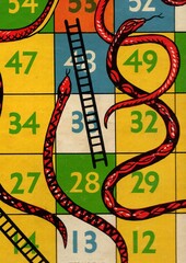 Obraz premium Detail from a vintage snakes and ladders game board.