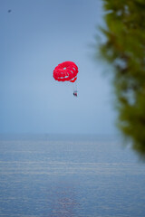Parasailing over the Adriatic Sea near Sveti Stefan, Montenegro