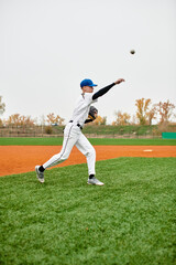 Talented teenage boy executes a perfect pitch on a vibrant baseball field