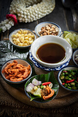 Traditional Thai Snack Miang Kham with Ingredients.