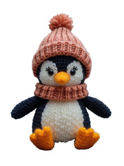 Cute knitted penguin wearing a cozy hat and scarf, perfect for winter decorations and cuddling