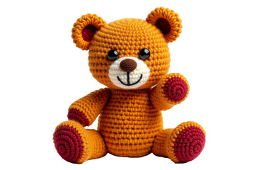 Handmade crocheted bear toy in vibrant orange color with cheerful expression set against neutral background
