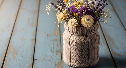 Handcrafted Comfort: A Cozy Knitted Vase Filled with a Rustic Arrangement of Dried Flowers







