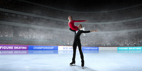 Figure skating couple skating on ice stadium.