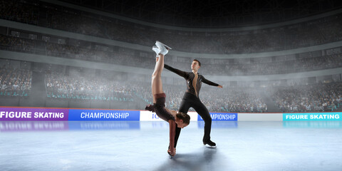Figure skating couple skating on ice stadium.