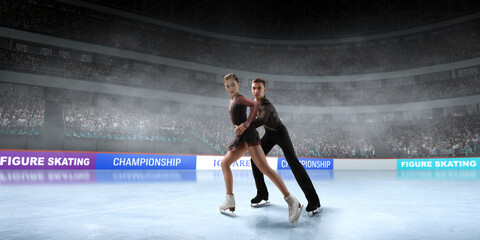 Figure skating couple skating on ice stadium.