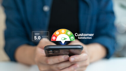 Close-up of a person using a smartphone with customer satisfaction rating, smiley feedback meter, and 5-star review interface. Concept of mobile user experience, review system, and client feedback.