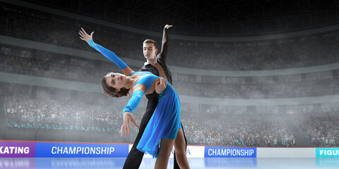 Figure skating pair skating on ice stadium.
