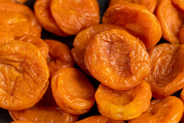 a large number of dried apricots used in cooking, orange dried apricots from small apricots are orange in color, dehydrated in the sun and without seeds
