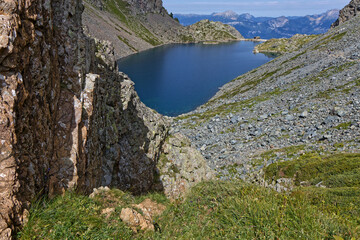 Lac du Crozet behind the rocks on the path to Col de La Pra