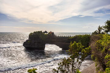 Batu Bolong Beach,Batu Bolong temple at Tanah Lot temple area in Bali island of Indonesia
