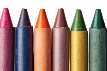 Close-up of a row of colorful crayons, tips aligned