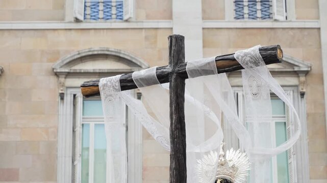 Wooden Cross during a solemn Holy Week procession through Barcelona. High quality 4k footage