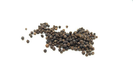 Black pepper on a white background.