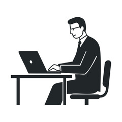Silhouette of male worker at desk using laptop for office tasks