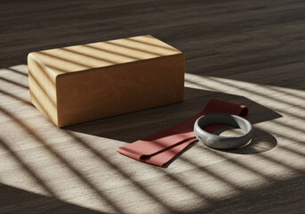 A wooden block, a red resistance band, and a gray fitness tracker are arranged on a wooden surface, illuminated by soft shadows from nearby blinds