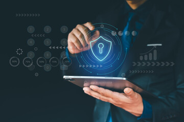 Cyber security, data protection concept, businessman using laptop with padlock on network security...
