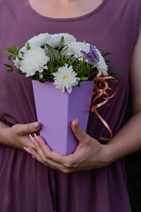 Stylish flower bouquet with white chrysanthemum blossoms