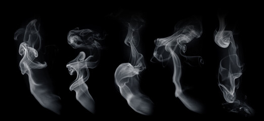 Fog or smoke set isolated on black background. White cloudiness, mist or smog background.
