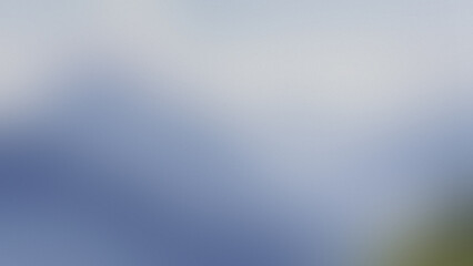 Abstract blue and white gradient background with a soft blurred texture