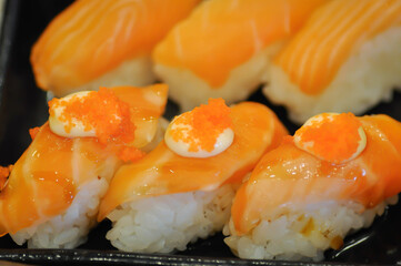 salmon sushi ,sushi or rice topped with salmon or salmon roll