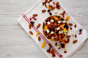 Healthy Dried Fruit and Nut Mix in a Bowl, top view. Space for text.
