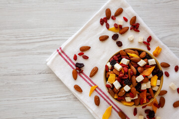 Healthy Dried Fruit and Nut Mix in a Bowl, top view. Copy space.