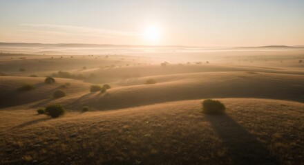 Fototapeta premium Golden Sunrise Over Rolling Hills Misty Morning Landscape.