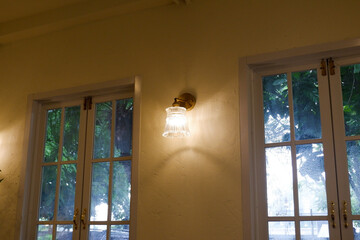 Cozy house exterior with wooden casement window and white wall rendering,Large estate home building Window Frame,minimal home concept.