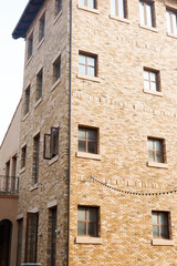 Modern Condominium and apartment building red brick wall in the city downtown,Residential Building on sky background.