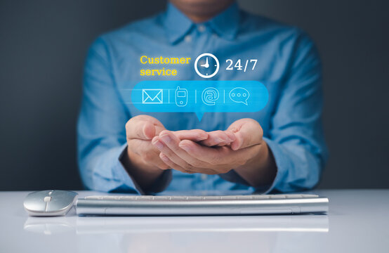AI agent smart automation Customer service 24/7 A person holding a digital globe with service icons, symbolizing global connectivity and technology. and support solution