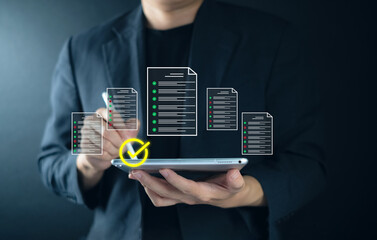 Checklist with ISO and document concept Digital documents and checklists above a laptop...