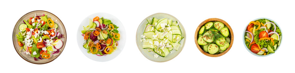 Cucumber salad isolated on white background. Homemade salad with fresh vegetables, cucumber, tomato, sweet pepper and lettuce in a plate. Vegetarian spring salad. Vegetarian diet. Healthy eating.