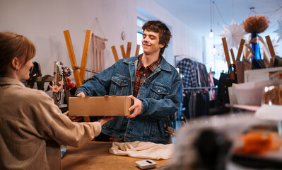The experience of young adults shopping in a stylish and trendy boutique store