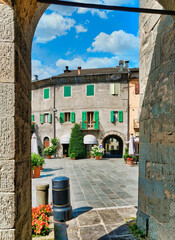 Fiumalbo (Modena, Italy), a glimpse of the main square from the parish church.