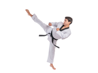 Martial artist performing high kick in traditional karate uniform isolated on a transparent background, young man in action pose wearing black belt practicing taekwondo or martial arts