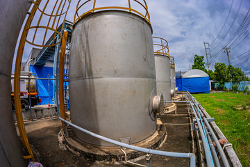 Stainless vertical steel tanks with equipment tank chemical cellar at the with stainless steel...