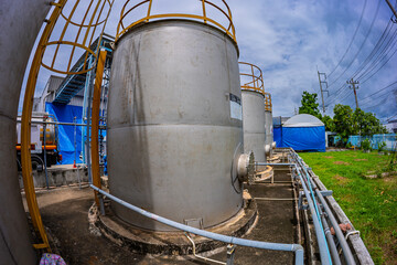 Stainless vertical steel tanks with equipment tank chemical cellar at the with stainless steel...