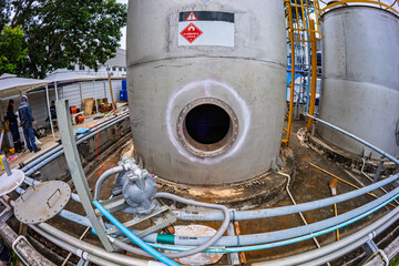 Stainless vertical steel tanks with equipment tank chemical cellar at the with stainless steel...