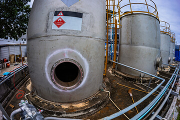 Stainless vertical steel tanks with equipment tank chemical cellar at the with stainless steel...