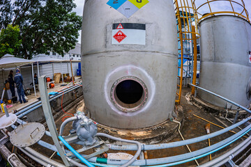 Stainless vertical steel tanks with equipment tank chemical cellar at the with stainless steel tanks cleaning