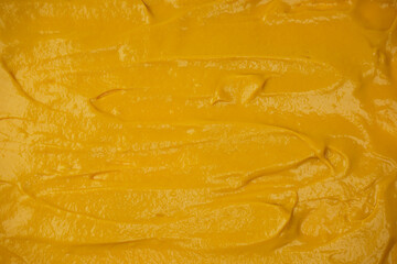 Yellow sauce splashes as a background.