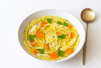 Noodle soup with chicken, carrots and greens. Healthy eating. Diet.